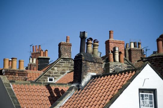 Chimney stacks in Manchester being repaired by Roof Repairs Manchester