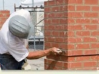 Chimney brickwork grinded out and pointed up like new.