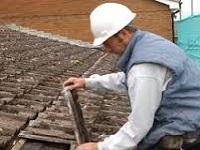 Uder-felt repairs on tiled roof in Urmston,Manchester