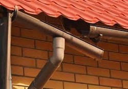 Cast iron gutters and pie changed for new plastic type guttering