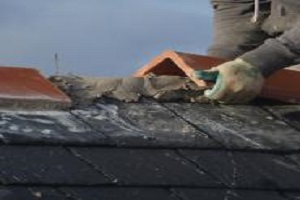 Ridge tiles fitted, bedded and pointed in Worsley Manchester